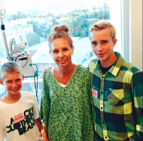 Two days post double mastectomy... the boys just wanted to see me alive at that point.  I doubled up on my pain meds, stood up, and let them know that momma was going to be fine