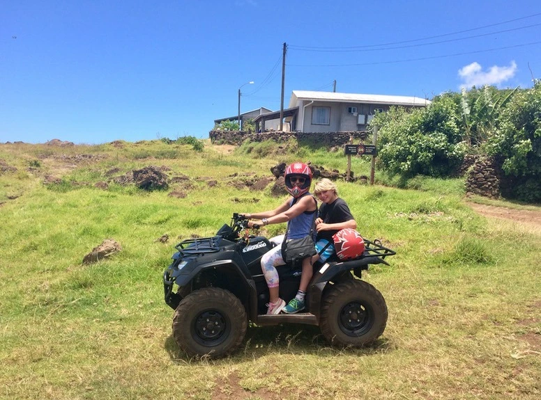 ATV fun with kids on the back seat