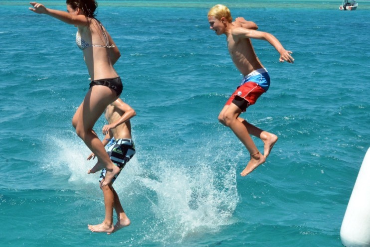 Tavarua Island resort FIji jumping into water