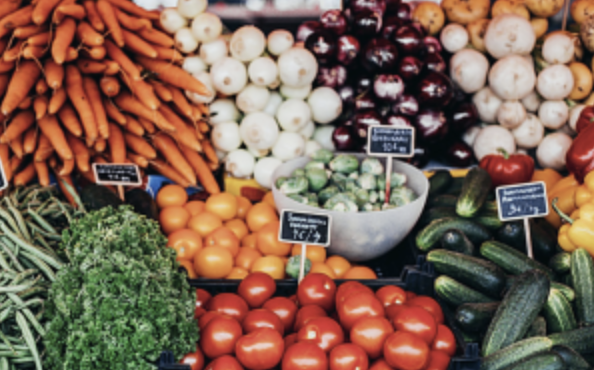 A variety of vegetables on a market stall