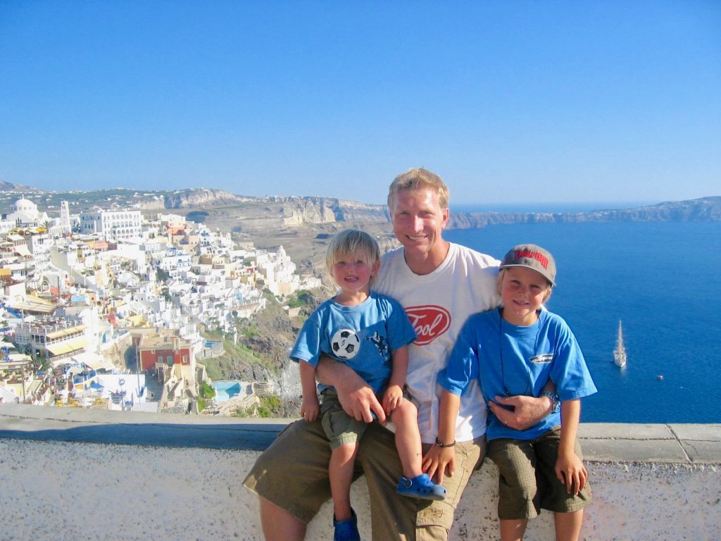 santorini greece, the family looking over the caldera