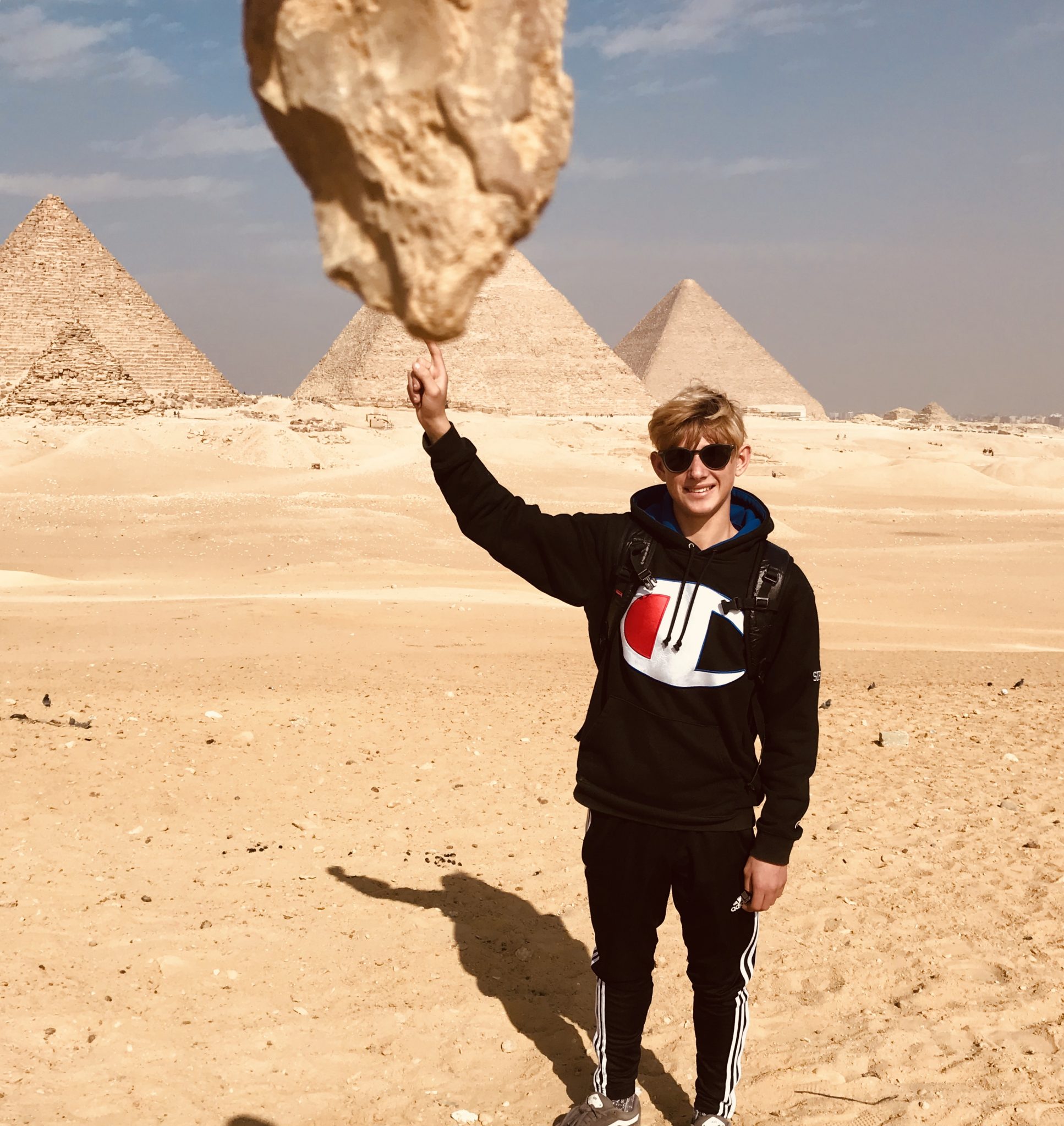 pyramids of giza on camels in cairo