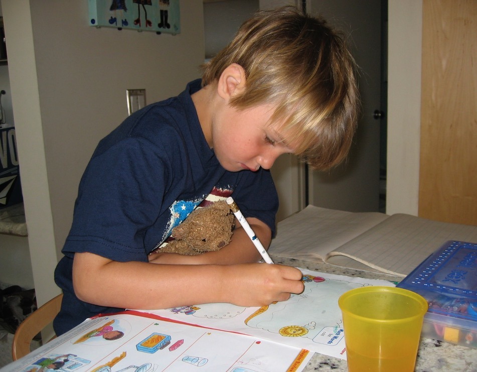 young boy painting