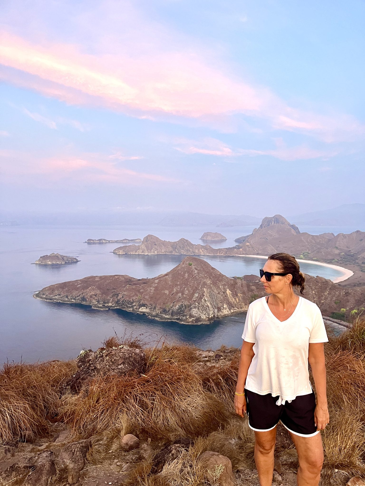 sunrise on Padar island - you can see white, black and pink sand beaches from one spot