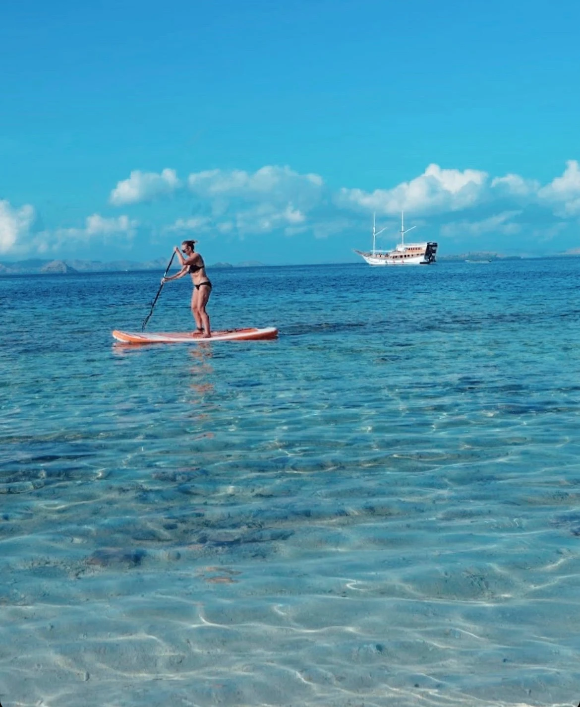 Stand up paddle boarding around Kelor Island